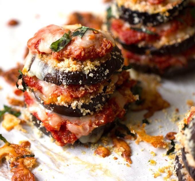 Eggplant Parmesan Stacks with thick tomato sauce, bread crumbs, melting cheese and slivered basil