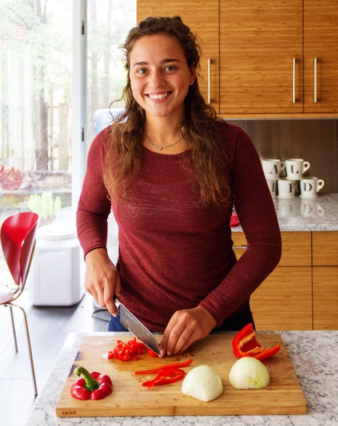 Eva chopping vegetables for gallo pinto