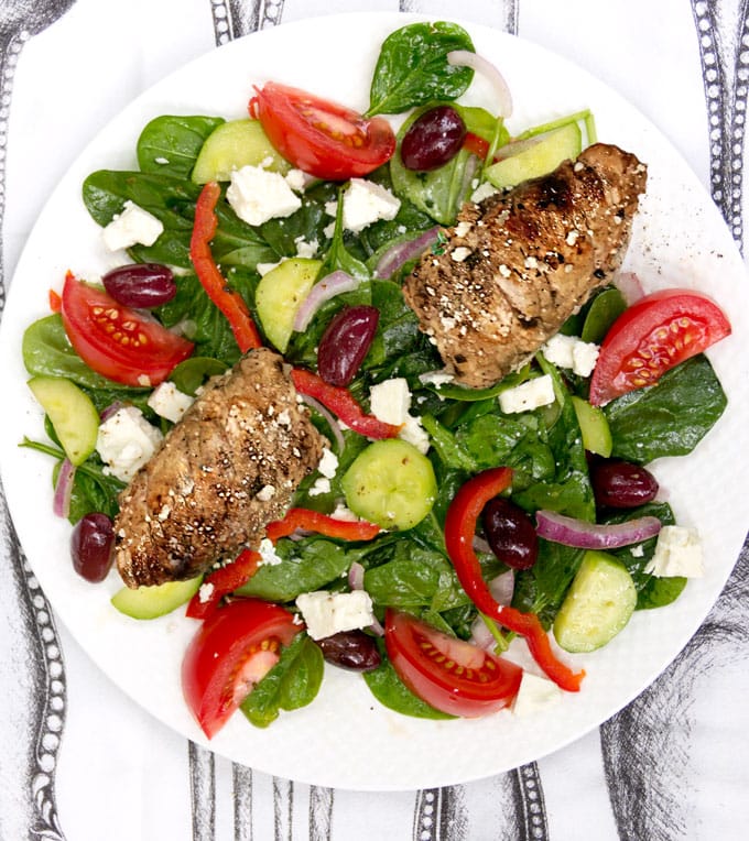 Greek spinach salad topped with lemon garlic marinated grilled turkey tips and cubes of salty feta is a fabulous, healthy weeknight dinner recipe.