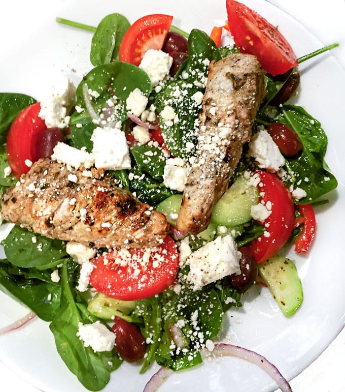 Greek spinach salad topped with lemon garlic marinated grilled turkey tips and cubes of salty feta is a fabulous, healthy weeknight dinner recipe.