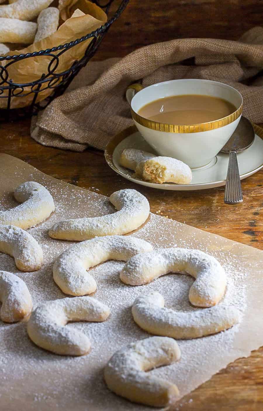 8 almond crescent cookies and a cup of coffee