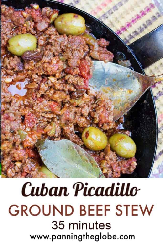 cuban picadillo (ground beef stew) in a black skillet