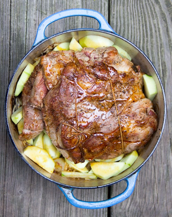 Pork Roast with Sauerkraut Apples and Onions is a delicious festive dish that takes only 5 ingredients and 20 minutes of prep. It's easy enough for Sunday dinner and special enough for New Year's Eve.