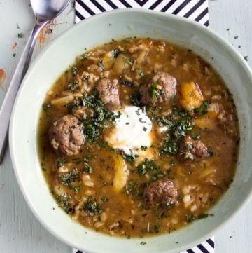 This hearty and delicious meatball soup is thickened with brown rice and flavored with sweet tangy apricots, shallots, and fragrant herbs. The topping of creamy yogurt and freshly chopped mint and tarragon, takes it from delicious to divine!