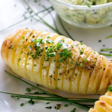 Hasselback Potatoes are the perfect holiday side dish, especially when they're basted with shallot chive butter while they cook!