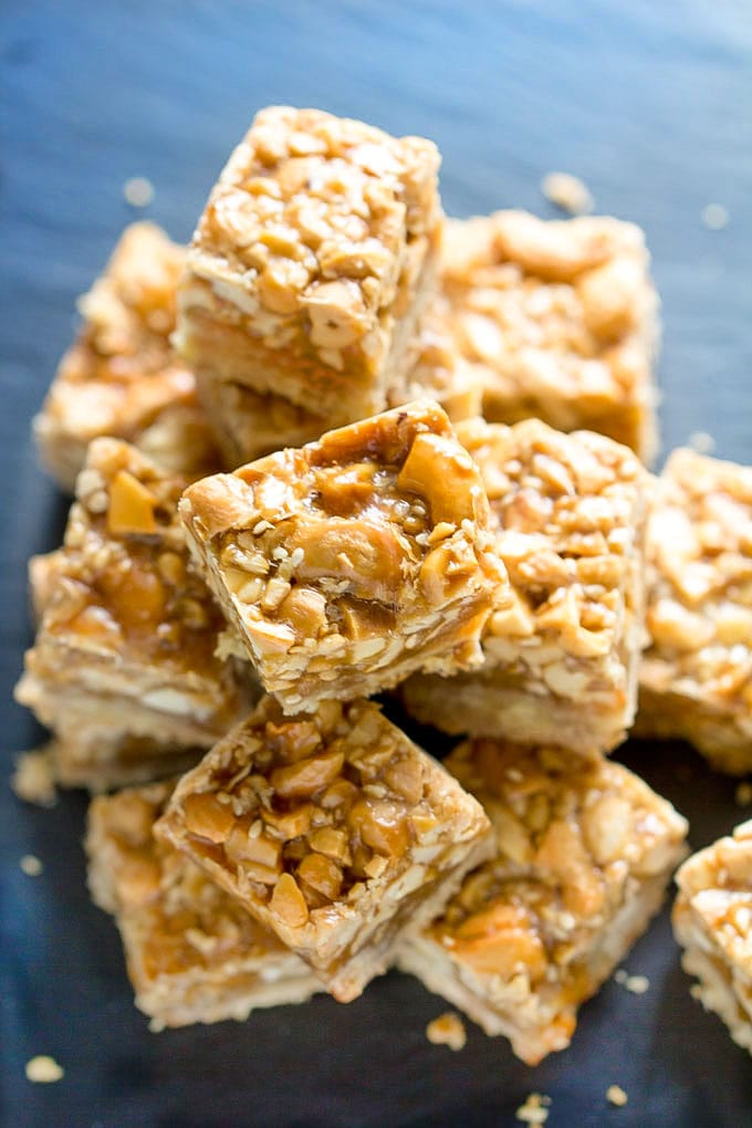 Salty, sweet, buttery, addictively delicious Sesame Cashew bars with caramel and shortbread. You can make Sofra bakery’s most popular recipe at home. Bake up a big batch ahead for your party or for delicious holiday gifts. They keep for two weeks.