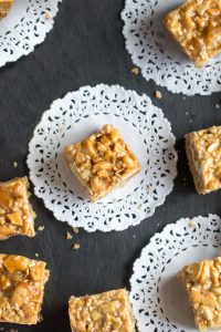 These Sesame Cashew bars are out of this word: luscious caramel with nuts and sesame seeds on top of a rich shortbread crust. They're the best seller at Sofra Bakery and now you can make them at home. Plus, they keep for two weeks, so you can make them ahead for your party or for delicious holiday gifts.