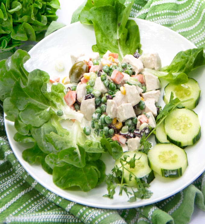 Salpicão is a famously delicious Brazilian chicken salad made with poached chicken, olives, raisins, green onions and spring vegetables in a tangy lime mayonnaise. It's festive and perfect for summer parties and picnics. The recipe is easy and you can do all the prep work ahead. Double or triple it if you're expecting a crowd. 