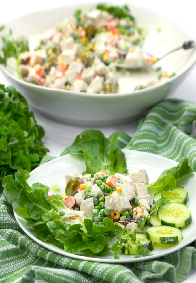 Salpicão is a famously delicious Brazilian chicken salad made with poached chicken, olives, raisins, green onions and spring vegetables in a tangy lime mayonnaise. It's festive and perfect for summer parties and picnics. The recipe is easy and you can do all the prep work ahead. Double or triple it if you're expecting a crowd. 