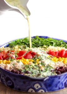 This is a wonderful main dish chopped salad recipe with a rainbow of healthy ingredients and a bright, tangy buttermilk dressing. Easily vegetarian or gluten-free | panningtheglobe.com