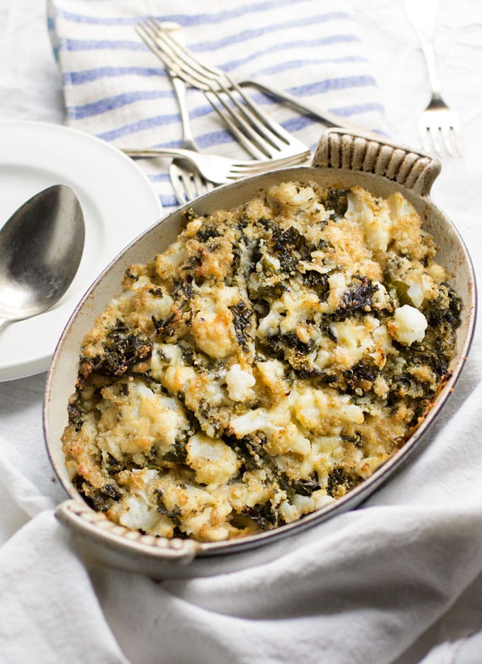 This cauliflower casserole is packed with nutritious veggies and just enough sharp cheddar cheese to make it taste decadent [gluten-free] l Panning The Globe Recipe