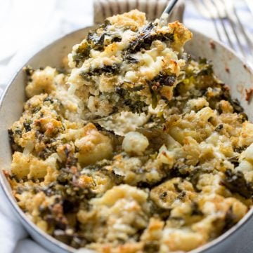 This cauliflower casserole is packed with nutritious veggies and just enough sharp cheddar cheese to make it taste decadent [gluten-free] l Panning The Globe Recipe