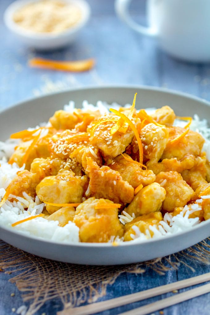 bowl of Chinese orange chicken over white rice