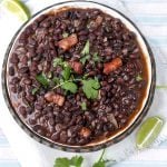 Authentic Cuban black beans are the quintessential side dish with many Latin recipes but we don't always have time to use dried beans which need an overnight soak and hours of cooking. When you want your black beans fast, this recipe will give you great tasting Cuban Black Beans in 35 minutes l www.panningtheglobe.com
