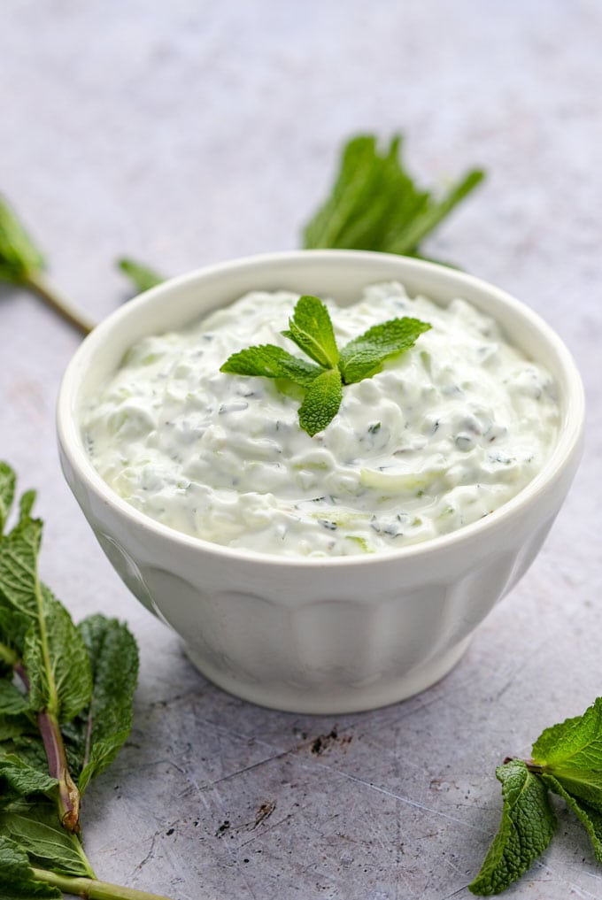 Cucumber Raita - a cooling, refreshing yogurt-based side dish to serve with hot and spicy Indian food. A quick and easy recipe l www.panningtheglobe.com