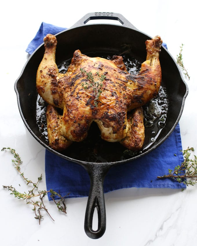 cooked roasted chicken in a skillet