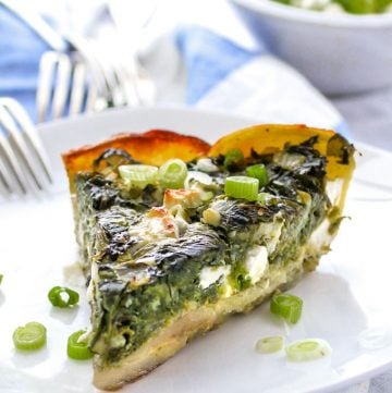 slice of Greek spinach pie in potato crust