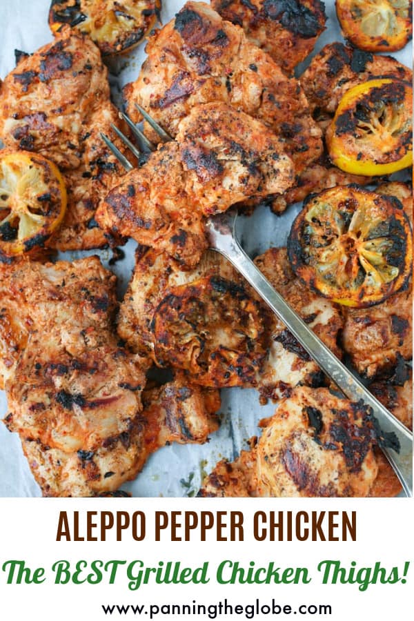 Pinterest pin: grilled chicken thighs and grilled lemons with a forked stabbed through one thigh
