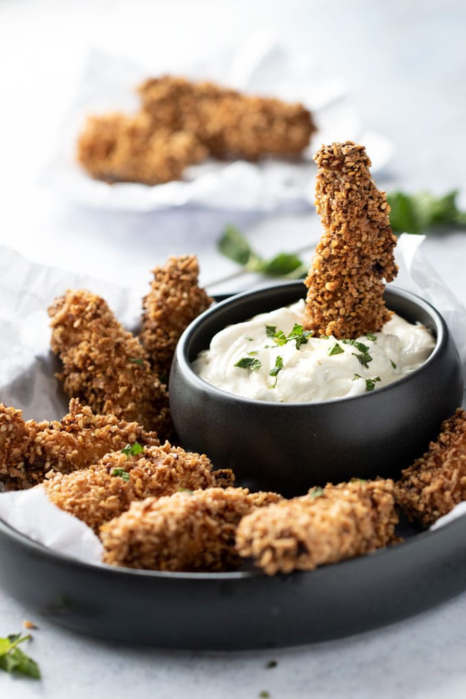 sesame fried chicken bites with tahini yogurt remoulade