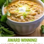 pinterest pin: award winning white chicken chili in a white bowl