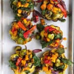 6 roasted squash halves stuffed with a rainbow of roasted fall vegetables.
