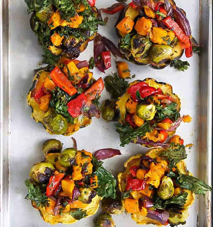 6 roasted squash halves stuffed with a rainbow of roasted fall vegetables.