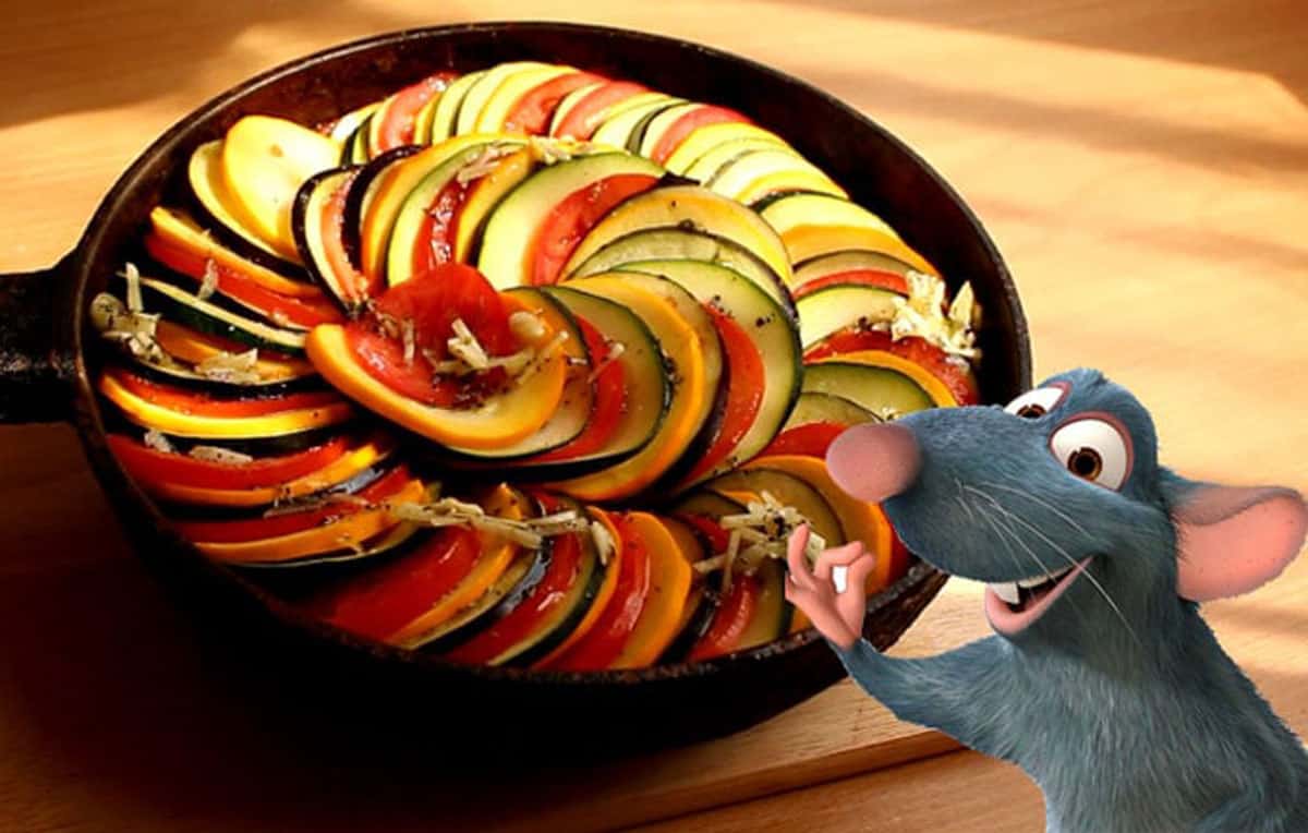 image from the movie Ratatouille, with Remy the rat next to his rainbow rataotuille.