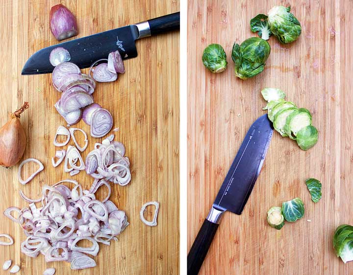 two cutting boards seen from above, one with shallots being thinly sliced by a large knife, the other showing a few Brussles sprouts, thinly sliced with a knife laying nearby.