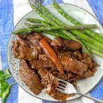 Nach Wasman's brisket, coated with tomato paste and cooked with lots of onions, is exceptionally tender and flavorful, and the recipe is surprisingly easy. #Brisket #BraisedBrisket #Beef