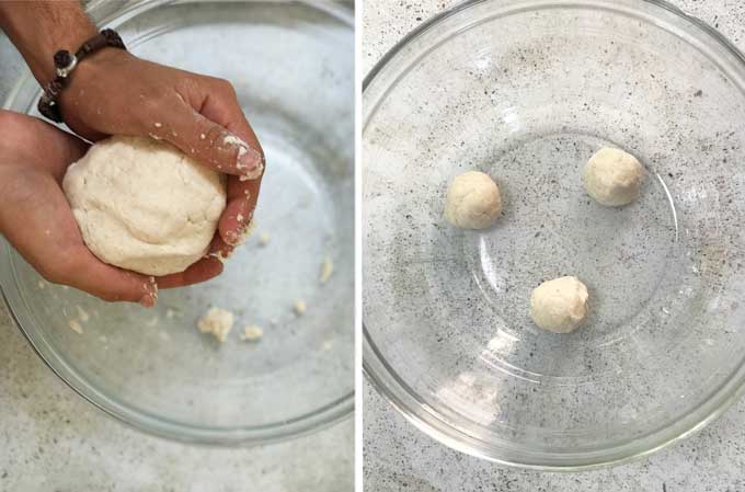 Hands holding a large ball of masa dough that's ready for making homemade corn tortillas and a bowl with three small balls of mass ready to go into a tortilla press.