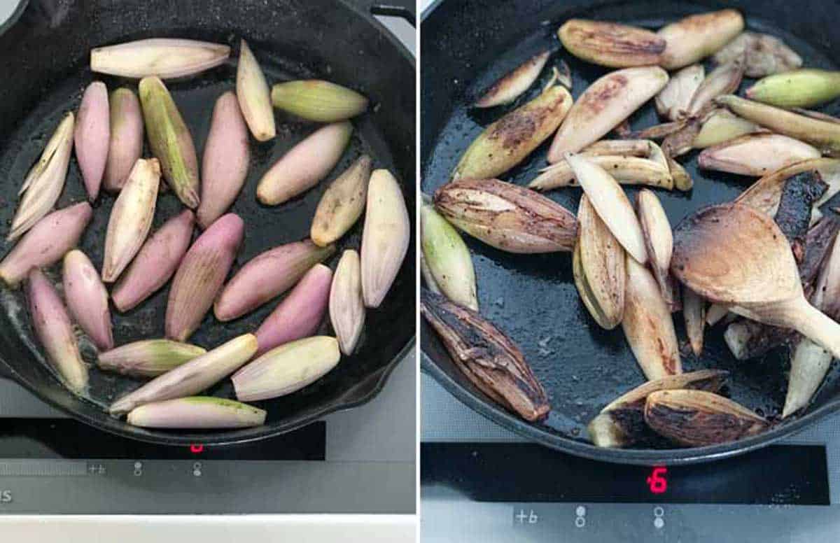 whole shallots cooking in a cast iron skillet