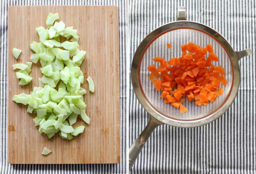 cutting board with chopped cucumber, mesh strained with chopped carrots