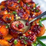 platter of roasted sweet potatoes with cranberries