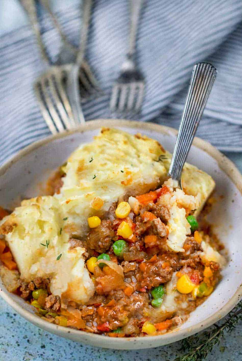 bowl of healthy shepherd's pie with forks pointing to it