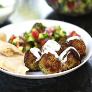 turkey falafel meatballs topped with lemon yogurt sauce.