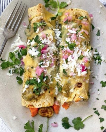 2 vegetarian Enchiladas Verdes with sweet potatoes and brussels sprouts