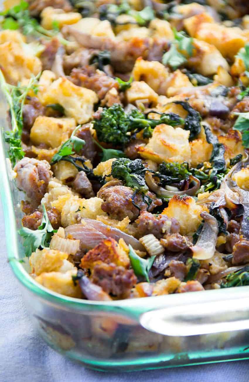 Italian sausage stuffing in a glass casserole dish