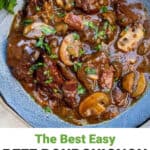 pinterest pin: blue bowl filled with beef bourguignon