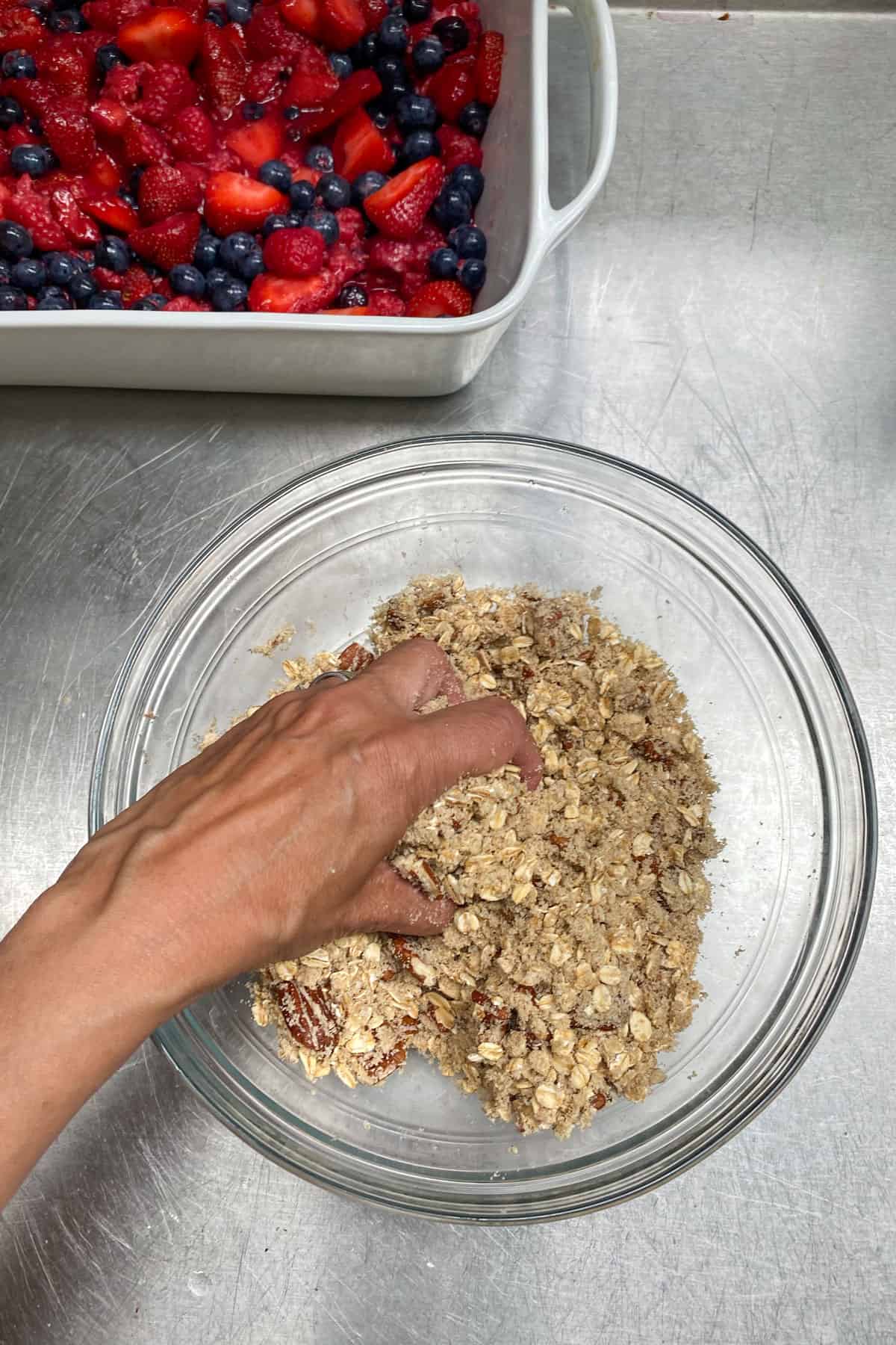mixing all the topping ingredients together by hand.