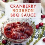 Cranberry bbq sauce in a glass bowl on a black and white flowered table cloth