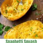 roasted spaghetti squash halves on a baking pan sprinkled with parsley
