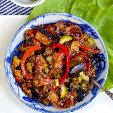 bowl filled with caponata, eggplant and bell pepper relish