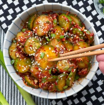 Korean cucumber salad in a bowl with chopsticks