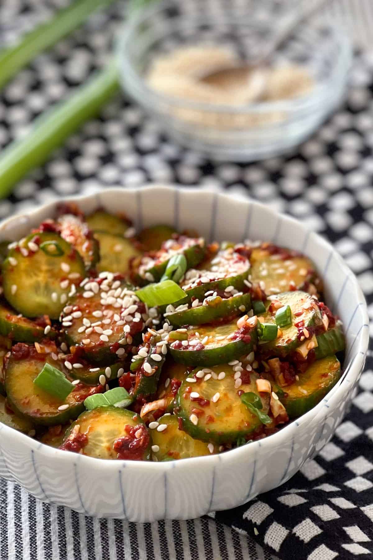 Korean cucumber salad in a bowl with chopsticks