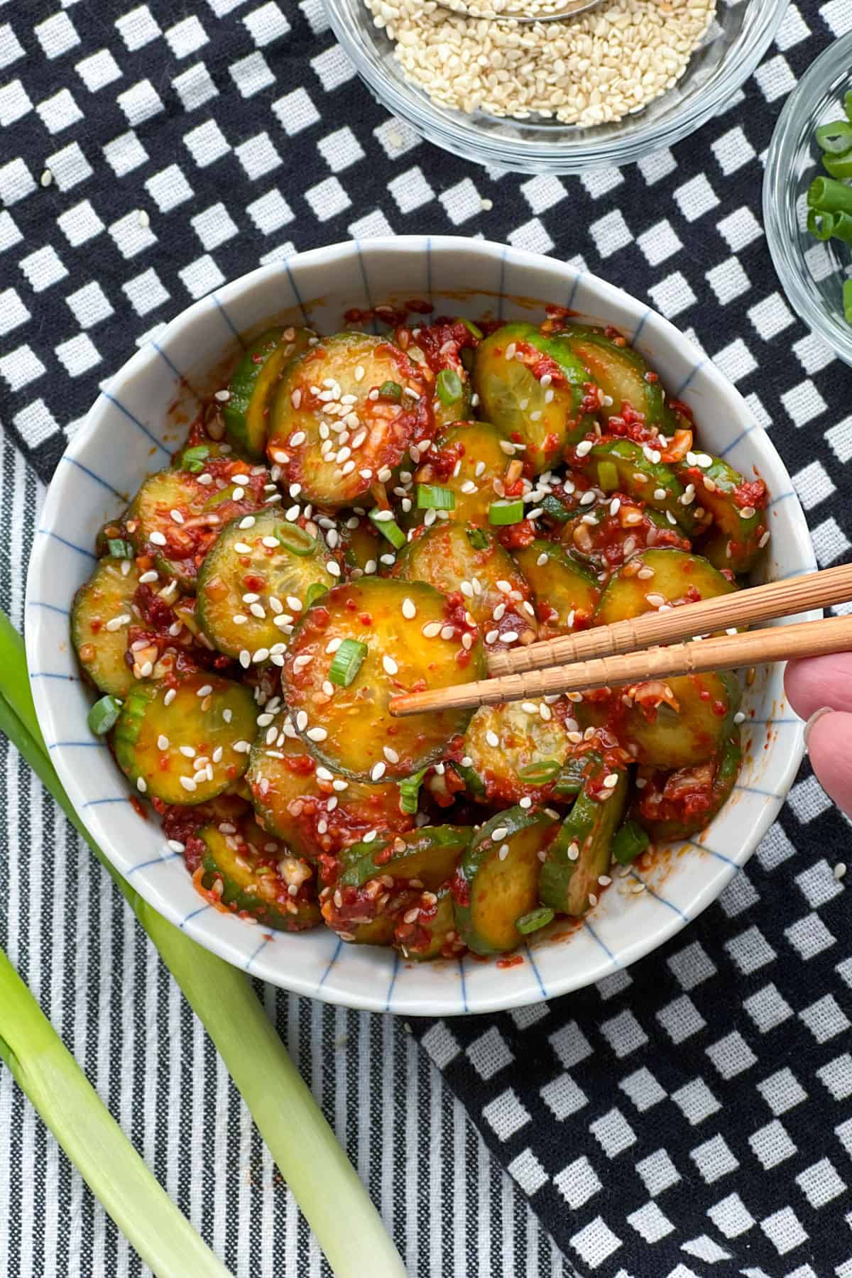 Korean cucumber salad in a bowl with chopsticks