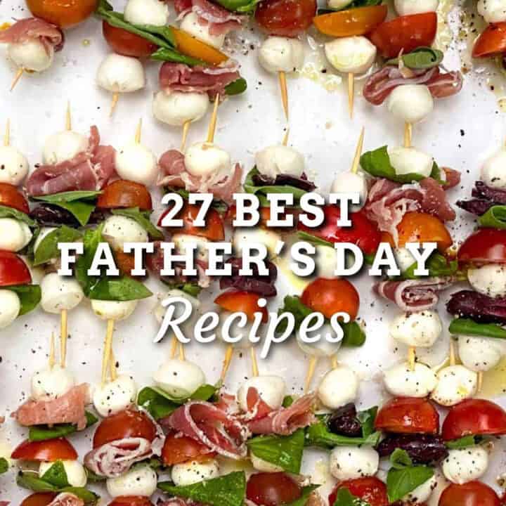 dozen of mini caprese salad skewers on a white platter