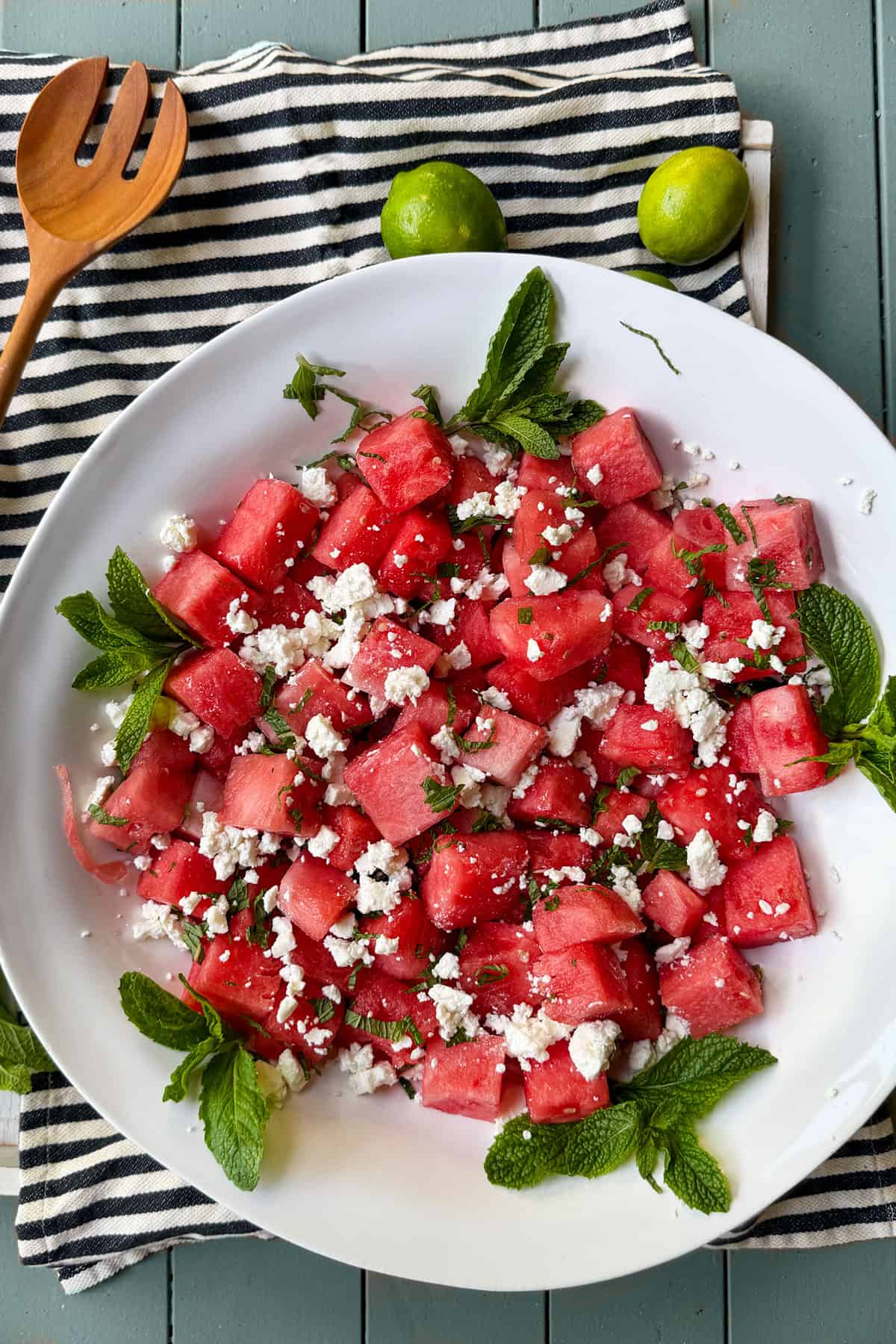 watermelon salad with feta and mint in a serving bowl.