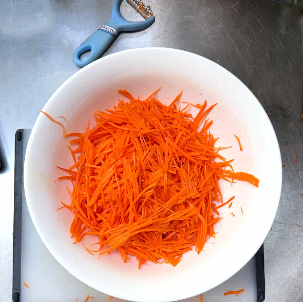 A big bowl of shredded carrots